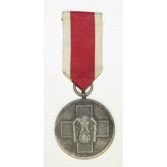 Medalla de bienestar social con cinta original. Espenlaub militaria